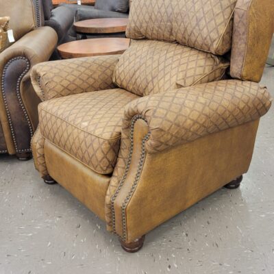 This All Leather, High-backed Recliner Is Detailed With Rich Tooling Across The Back, Seat, And Arms Making For Distinctive Boldness And Individuality!