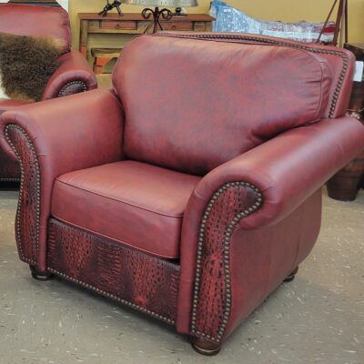 This Deep Red Chair With Tooled Accents Came Completely Custom Made. Call Us About Customizing Your Living Room Furniture Today!