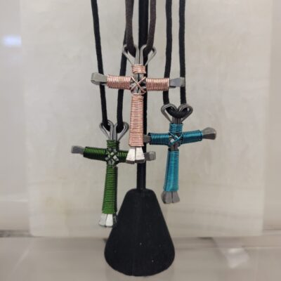 A Few Colors Of The Cross Necklaces Sold At Rustler's Junction.