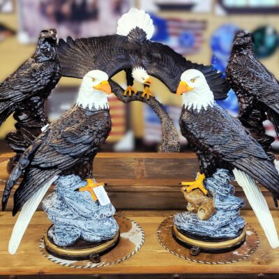 Pictured Here Are Our Left And Right Facing Eagles Perched On Rock Shown Lifelike And In Our Black/brown Finish. Behind Is Our Custom Eagle On Branch With A 5 Foot Wing Span.